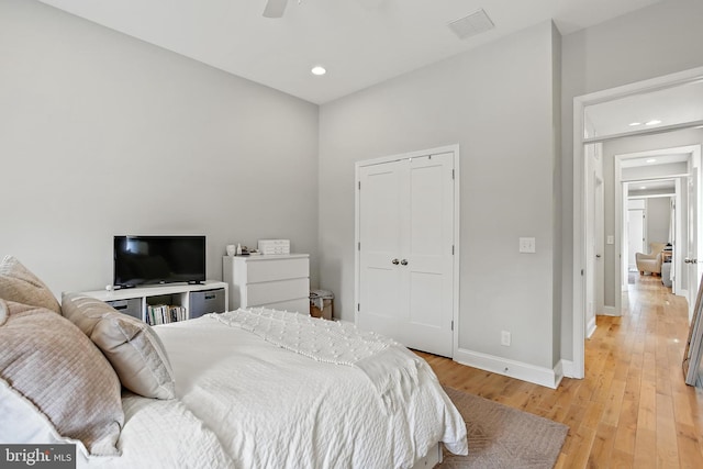 419 S E Ave, Baltimore, MD 21224 - bedroom with fridge, light wood-style floors, recessed lighting, baseboards, and a closet