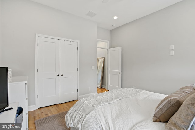 419 S E Ave, Baltimore, MD 21224 - bedroom with light wood-style floors, a closet, baseboards, and recessed lighting