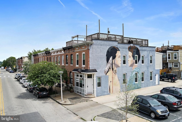 419 S E Ave, Baltimore, MD 21224 - view of property featuring uncovered parking