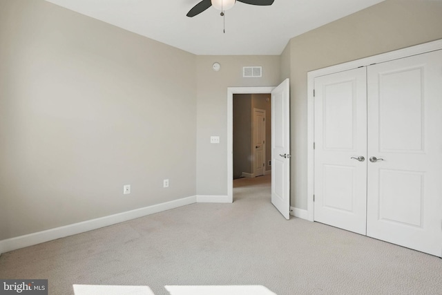 9870 Buchanan Loop, Manassas, VA 20110 - unfurnished bedroom with baseboards, light colored carpet, a closet, and ceiling fan