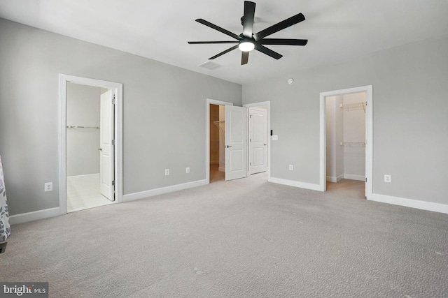 9870 Buchanan Loop, Manassas, VA 20110 - unfurnished bedroom with a walk in closet, a closet, and carpet