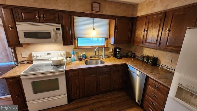319 Morton Ave, Paulsboro, NJ 08066 - kitchen featuring white appliances, a sink, backsplash, and light stone counters