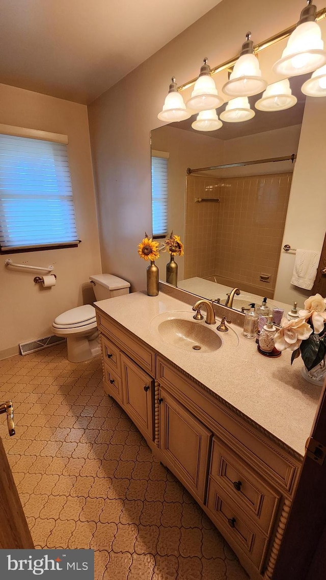 319 Morton Ave, Paulsboro, NJ 08066 - bathroom featuring vanity, toilet, and a shower with curtain