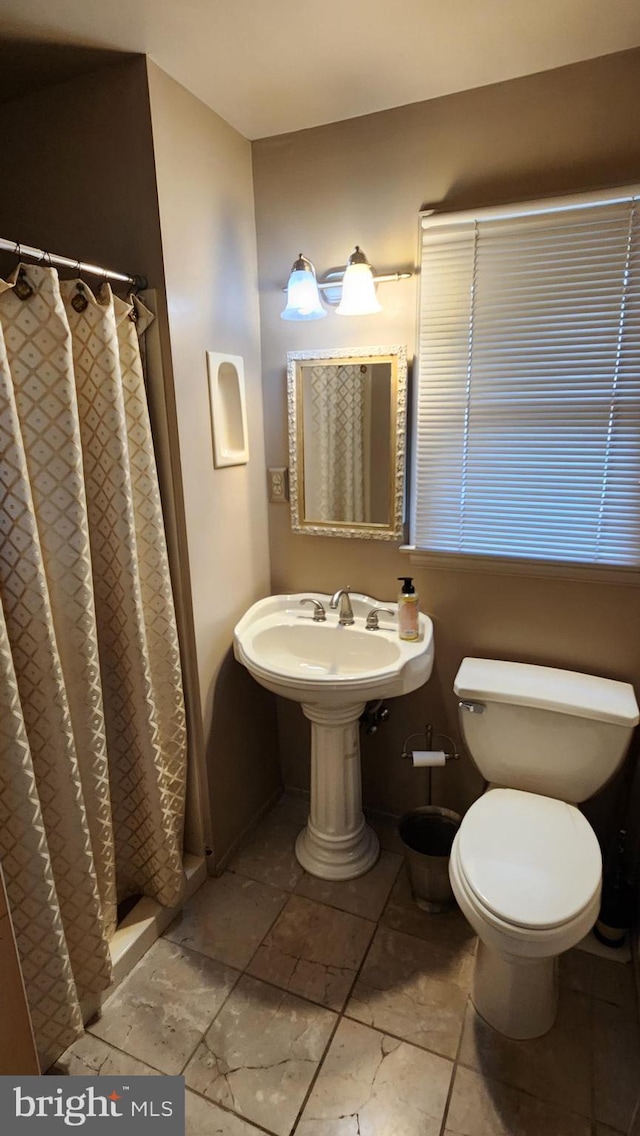 319 Morton Ave, Paulsboro, NJ 08066 - full bathroom with toilet and a shower stall
