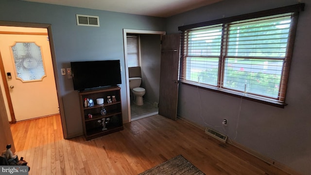 319 Morton Ave, Paulsboro, NJ 08066 - unfurnished bedroom with wood finished floors, baseboards, and a closet