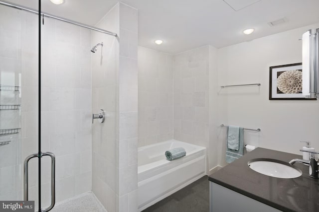 2101 Market St Unit 3405, Philadelphia, PA 19103 - bathroom featuring a stall shower, vanity, recessed lighting, and a tub