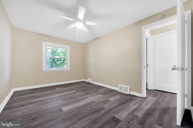 415 Arlington Ave, Upper Darby, PA 19082 - empty room with a ceiling fan, baseboards, dark wood-style floors, and a smoke detector