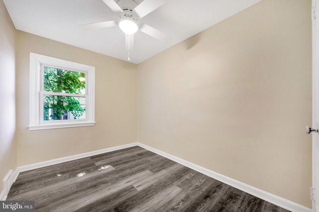 415 Arlington Ave, Upper Darby, PA 19082 - unfurnished room with dark wood-type flooring, a ceiling fan, and baseboards