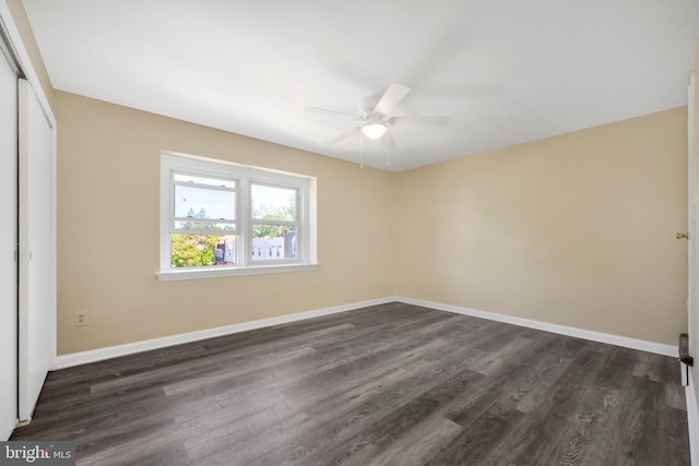415 Arlington Ave, Upper Darby, PA 19082 - unfurnished bedroom with a closet, dark wood-type flooring, and baseboards