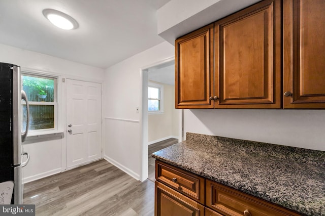 415 Arlington Ave, Upper Darby, PA 19082 - kitchen featuring freestanding refrigerator, light wood-type flooring, healthy amount of natural light, and baseboards