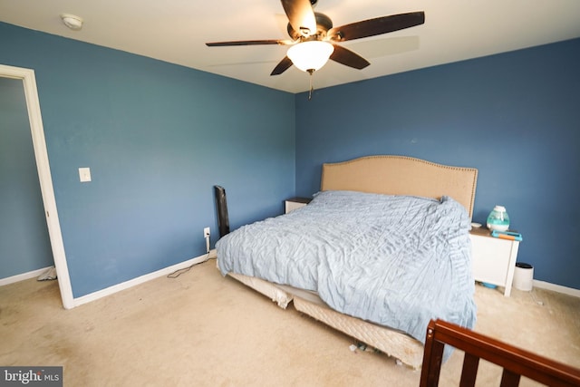 9557 Old Railroad Rd, Mardela Springs, MD 21837 - carpeted bedroom with baseboards and ceiling fan
