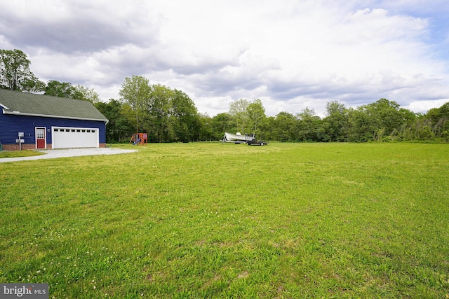 9557 Old Railroad Rd, Mardela Springs, MD 21837 - view of grassy yard featuring a playground and driveway