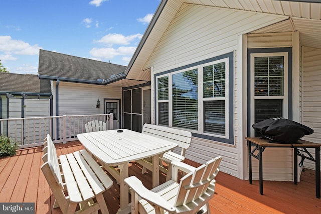 deck featuring outdoor dining space