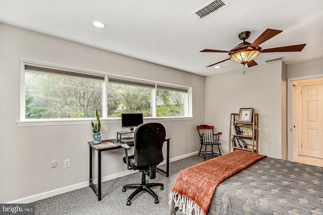 carpeted bedroom with recessed lighting, baseboards, and an office area