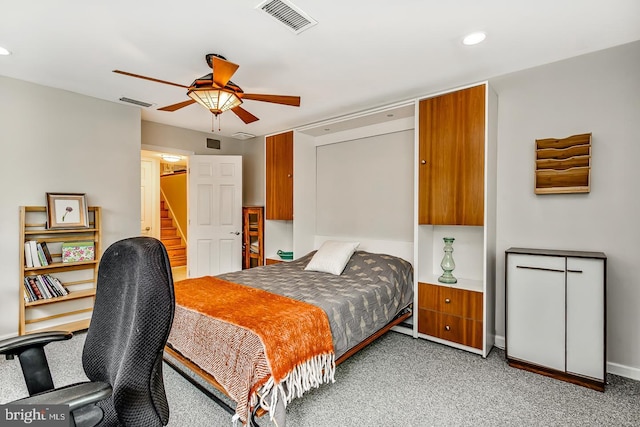 bedroom featuring light carpet, recessed lighting, and a ceiling fan