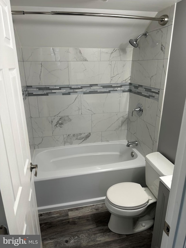 7235 Baltimore Annapolis Blvd, Glen Burnie, MD 21061 - full bathroom with wood finished floors, vanity, toilet, and tub / shower combination