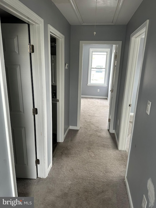 7235 Baltimore Annapolis Blvd, Glen Burnie, MD 21061 - corridor featuring attic access, carpet, and baseboards
