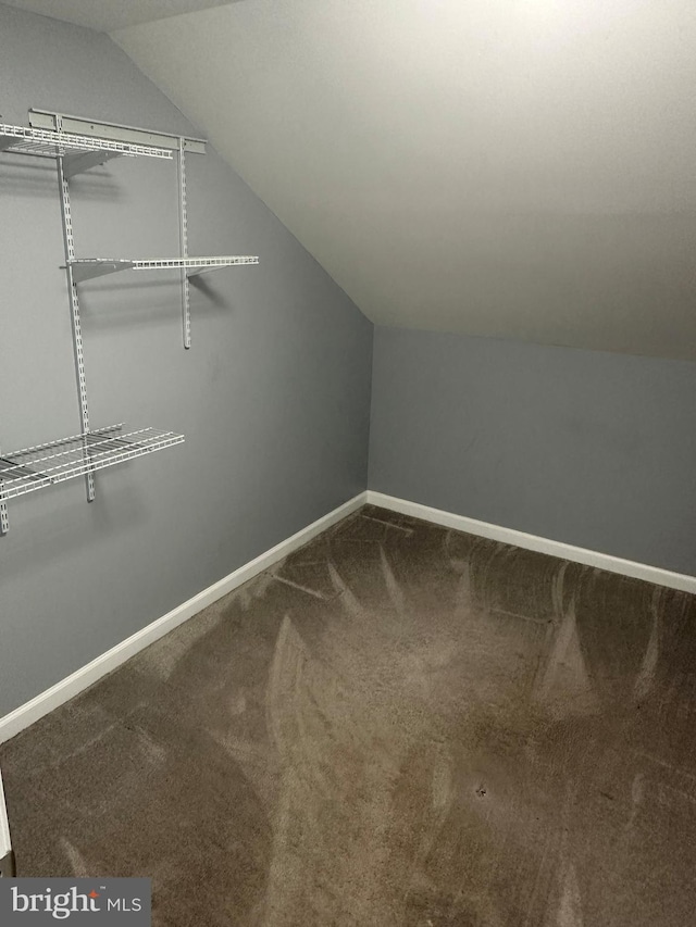 7235 Baltimore Annapolis Blvd, Glen Burnie, MD 21061 - walk in closet featuring lofted ceiling and carpet floors