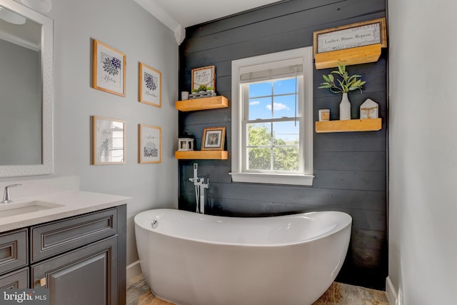 6034 Franconia Rd, Alexandria, VA 22310 - bathroom with vanity, a soaking tub, and wood walls