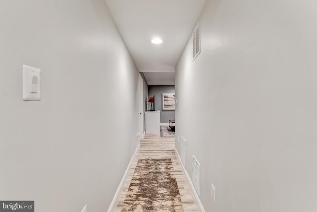 6034 Franconia Rd, Alexandria, VA 22310 - hallway with light wood finished floors, baseboards, and recessed lighting