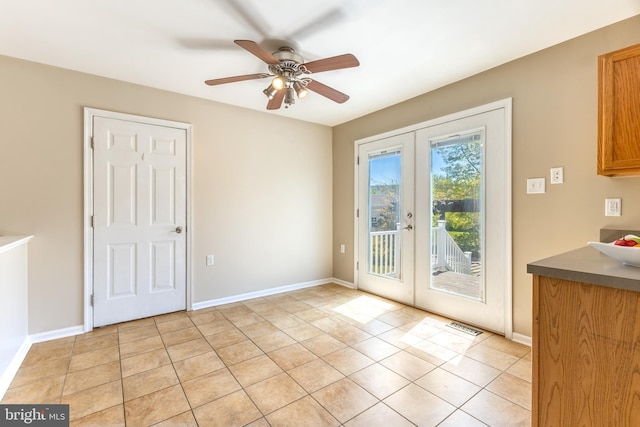 503 Forest Ave, Bellefonte, PA 16823 - doorway featuring french doors, ceiling fan, light tile patterned floors, and baseboards