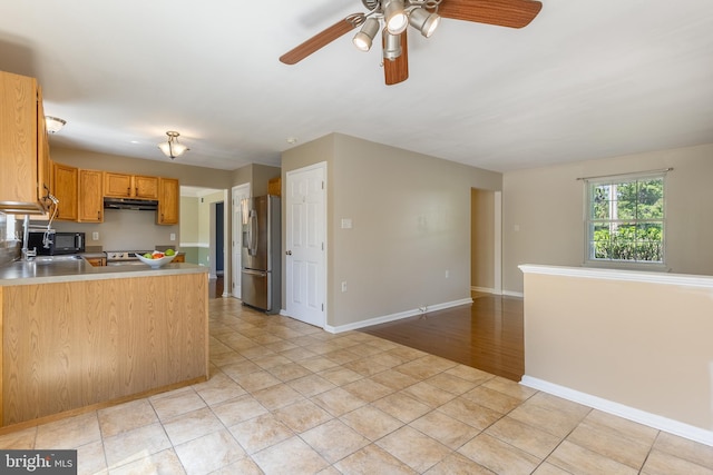 503 Forest Ave, Bellefonte, PA 16823 - kitchen featuring appliances with stainless steel finishes, a ceiling fan, range hood, and baseboards