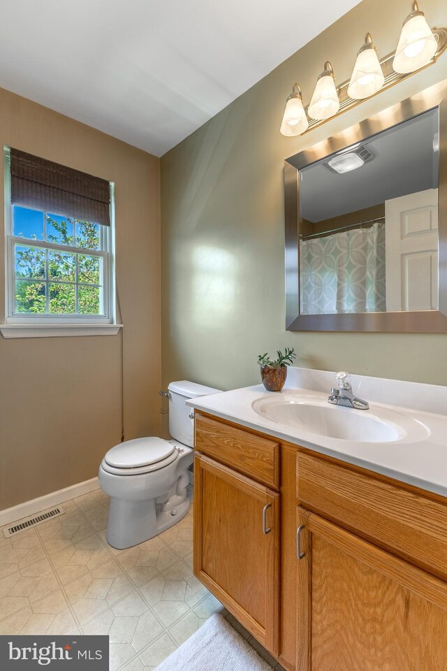 503 Forest Ave, Bellefonte, PA 16823 - bathroom featuring toilet and vanity