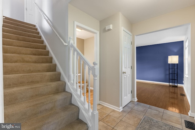 503 Forest Ave, Bellefonte, PA 16823 - stairway featuring tile patterned floors and baseboards