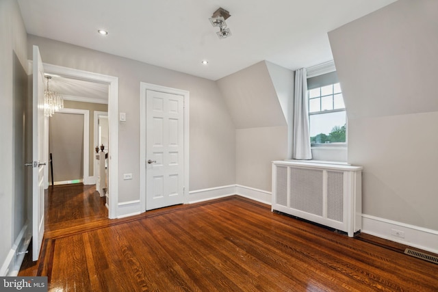 2424 Golf Rd, Philadelphia, PA 19131 - additional living space featuring radiator, a chandelier, wood finished floors, baseboards, and recessed lighting