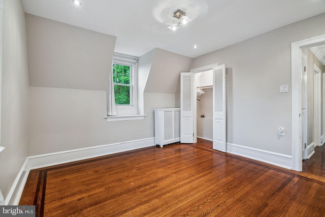 2424 Golf Rd, Philadelphia, PA 19131 - bonus room with wood finished floors, baseboards, vaulted ceiling, and radiator heating unit