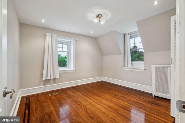 2424 Golf Rd, Philadelphia, PA 19131 - bonus room featuring radiator, baseboards, wood finished floors, vaulted ceiling, and recessed lighting