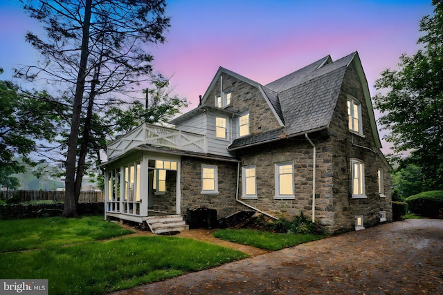 2424 Golf Rd, Philadelphia, PA 19131 - view of front of house featuring stone siding and a balcony