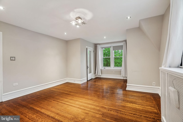 2424 Golf Rd, Philadelphia, PA 19131 - unfurnished living room with wood finished floors, baseboards, and recessed lighting