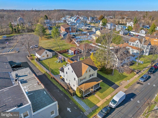 aerial view of property's location with nearby suburban area