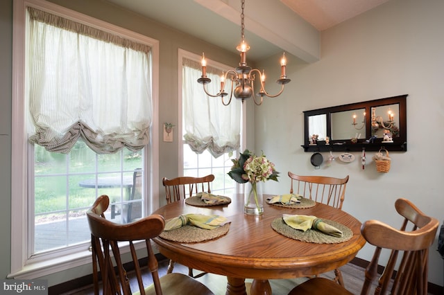 dining space featuring a chandelier