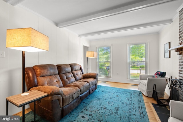 2112 Wittington Blvd, Alexandria, VA 22308 - living area featuring beam ceiling, wood finished floors, and a brick fireplace