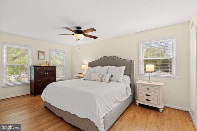 2112 Wittington Blvd, Alexandria, VA 22308 - bedroom with baseboards, light wood-type flooring, and a ceiling fan