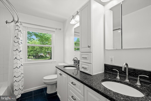 2112 Wittington Blvd, Alexandria, VA 22308 - bathroom with toilet, tile patterned floors, double vanity, and shower / bath combo with shower curtain