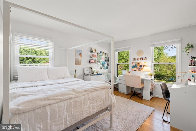 2112 Wittington Blvd, Alexandria, VA 22308 - bedroom with a desk and light wood-style floors