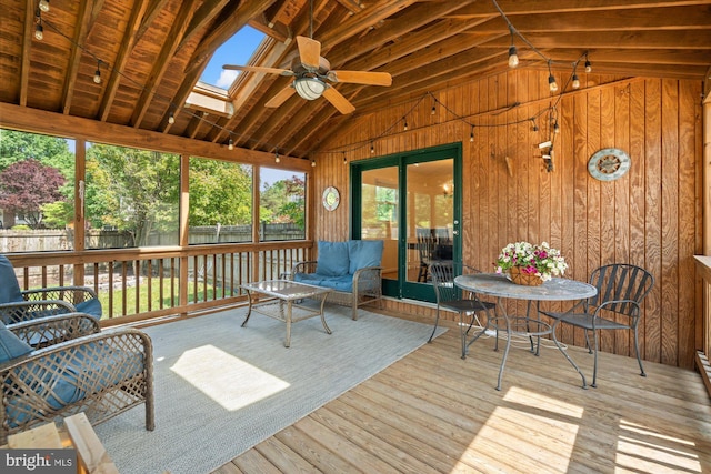 2112 Wittington Blvd, Alexandria, VA 22308 - sunroom featuring a ceiling fan, vaulted ceiling, a skylight, and an outdoor living space