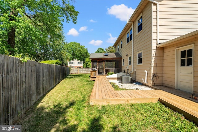 2112 Wittington Blvd, Alexandria, VA 22308 - back of property featuring a sunroom, a wooden deck, and cooling unit
