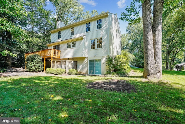 5938 New England Woods Dr, Burke, VA 22015 - rear view of house with a chimney, a lawn, and a wooden deck