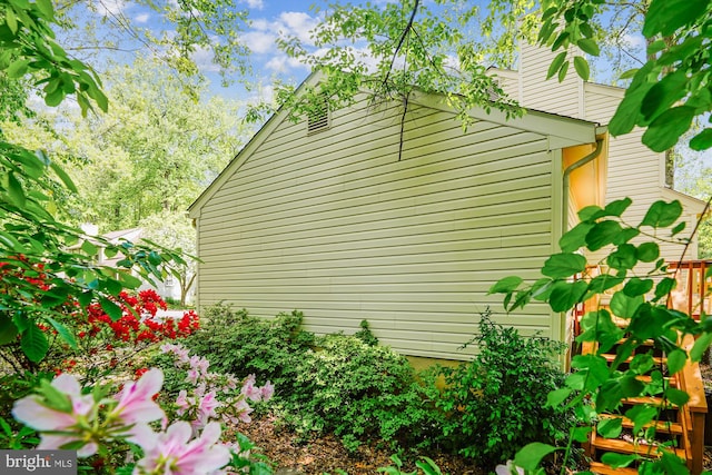 5938 New England Woods Dr, Burke, VA 22015 - view of side of property featuring a chimney