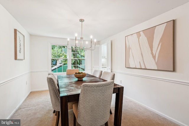 5938 New England Woods Dr, Burke, VA 22015 - dining space featuring light carpet and a chandelier
