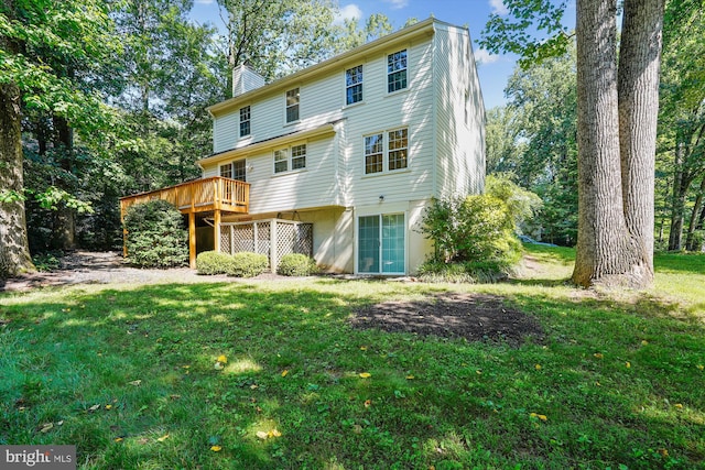 5938 New England Woods Dr, Burke, VA 22015 - back of property featuring a chimney, a wooden deck, and a yard