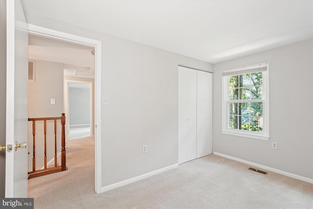 5938 New England Woods Dr, Burke, VA 22015 - unfurnished bedroom with carpet flooring and a closet