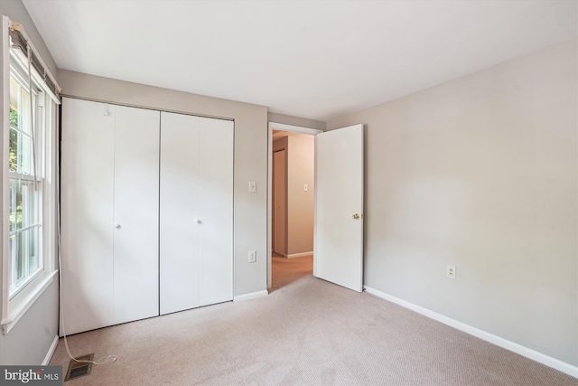 5938 New England Woods Dr, Burke, VA 22015 - unfurnished bedroom featuring a closet and carpet floors