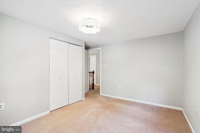 5938 New England Woods Dr, Burke, VA 22015 - unfurnished bedroom with light carpet and a closet