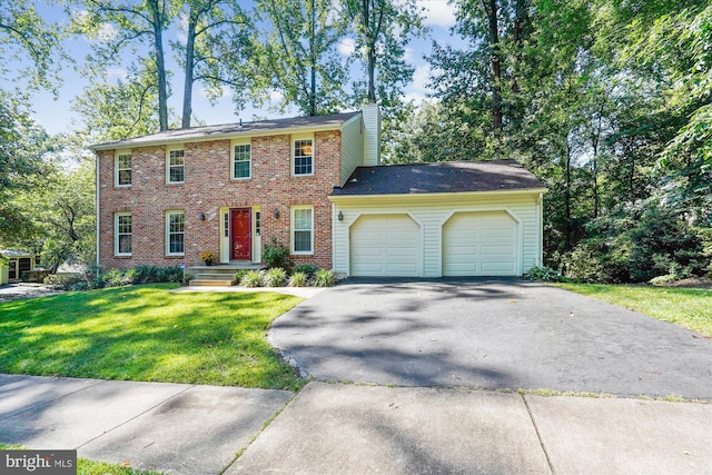 5938 New England Woods Dr, Burke, VA 22015 - colonial inspired home featuring a garage, asphalt driveway, a front lawn, brick siding, and a chimney