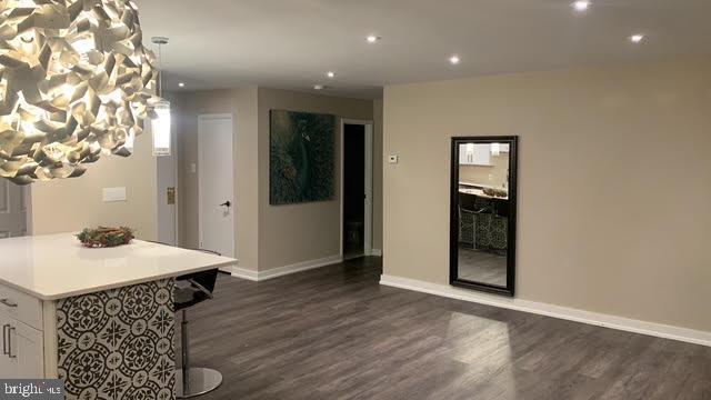 12001 Old Columbia Pike Unit 12001, Silver Spring, MD 20904 - interior space featuring dark wood-type flooring, recessed lighting, and baseboards